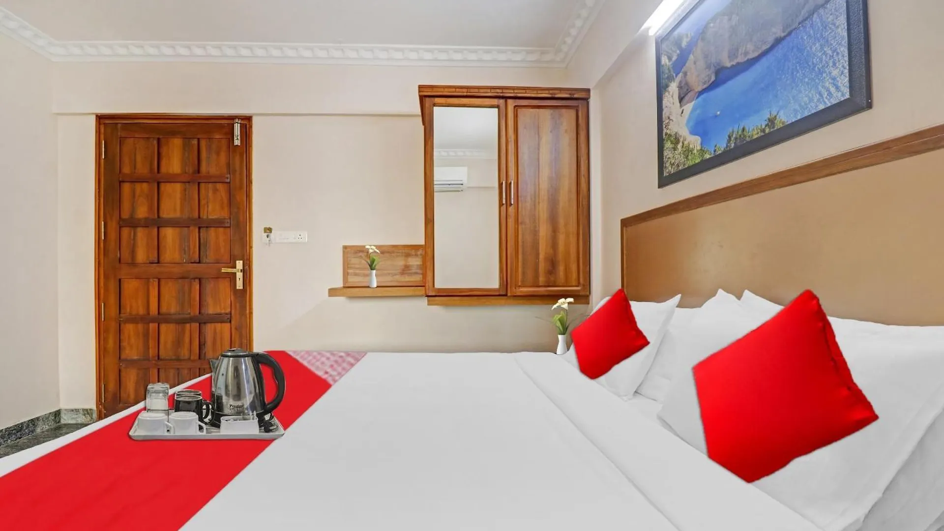 Hotel O Poptavern Premium Thiruvananthapuram