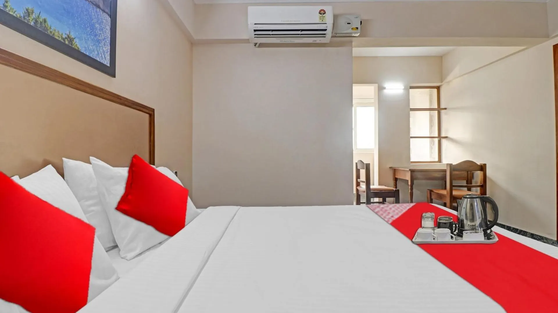 Hotel O Poptavern Premium Thiruvananthapuram