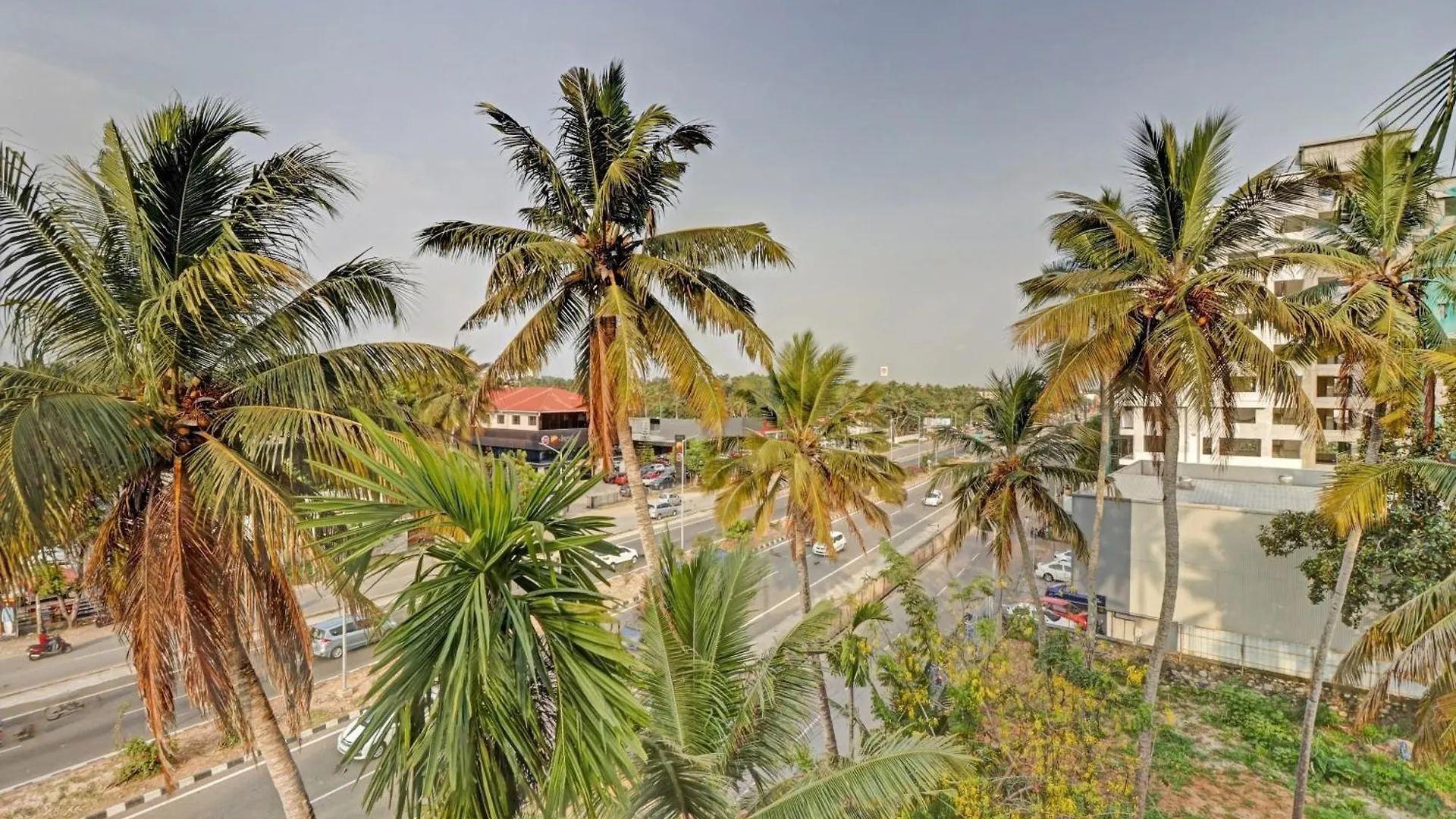 Hotel O Poptavern Premium Thiruvananthapuram